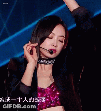 Woman In Choker With Microphone Saying Reve GIF