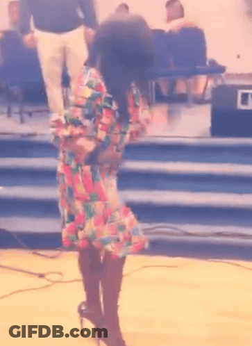 Woman In Colorful Dress And High Heels GIF