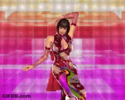 Woman In Colorful Dress Dancing GIF