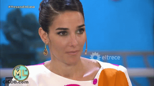 Woman In Colorful Dress On Mesaza En Casa GIF