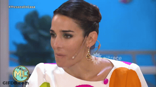 Woman In Colorful Dress On Mesaza Encasa GIF
