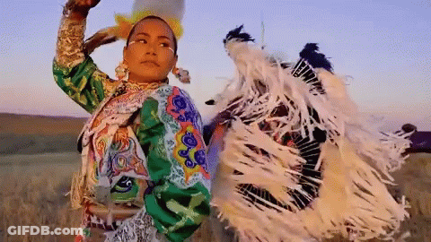 Woman In Colorful Native American Dress Dancing GIF