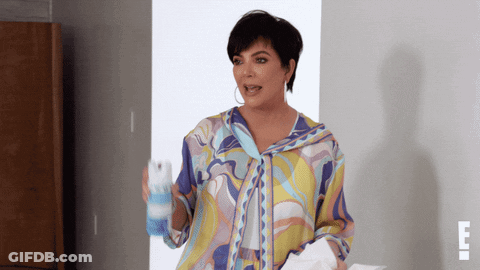 Woman In Colorful Shirt Standing GIF