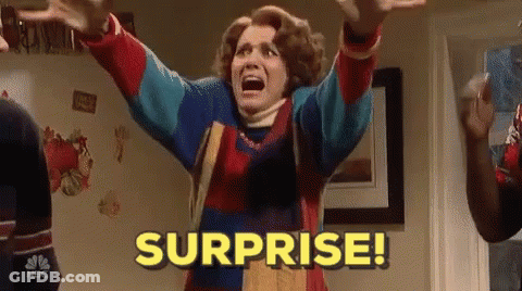 Woman In Colorful Sweater Screaming Surprise GIF