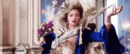 Woman In Costume Holding Sword GIF