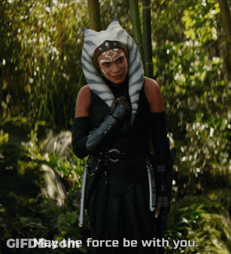 Woman In Costume Saying May The Force Be With You GIF