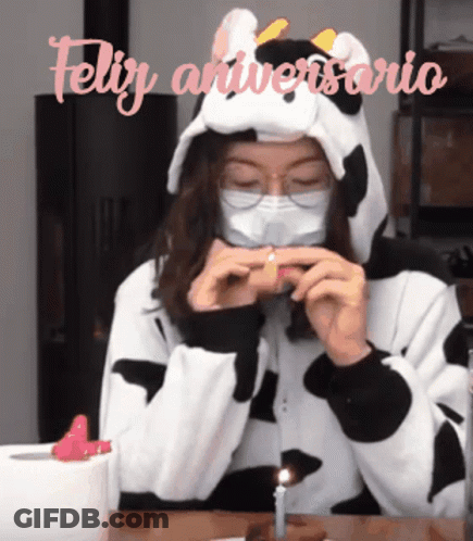 Woman In Cow Costume With Mask GIF