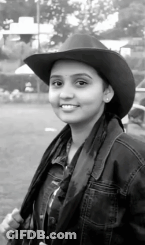 Woman In Cowboy Hat And Jacket GIF