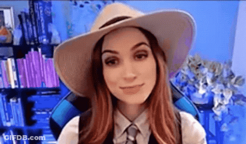 Woman In Cowboy Hat And Tie Smiling GIF