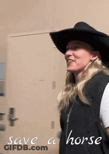 Woman In Cowboy Hat And Vest Saying Save A Horse GIF