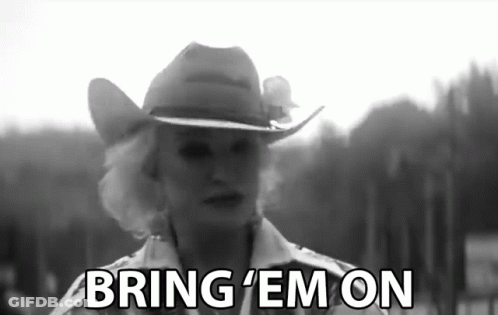 Woman In Cowboy Hat Saying Bring Em On GIF