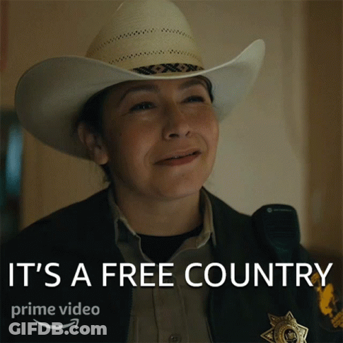 Woman In Cowboy Hat Smiling It's A Free Country GIF
