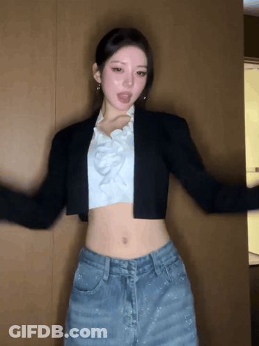Woman In Crop Top And Jeans Dancing GIF