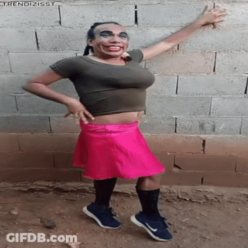Woman In Crop Top And Pink Skirt Arms Out GIF