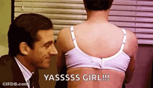Woman In Crop Top And Plaid Shirt Dancing With Microphone GIF