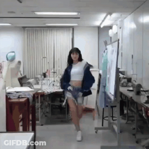 Woman In Crop Top And Shorts Walking GIF