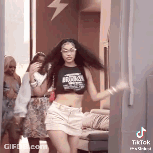 Woman In Crop Top And White Shorts Dancing With Others GIF