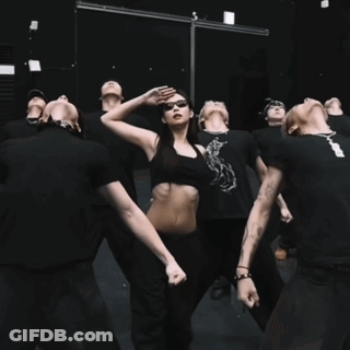 Woman In Crop Top Dancing With Group GIF