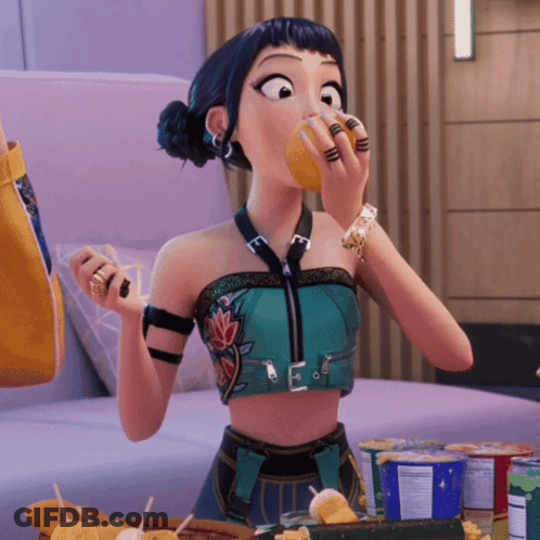 Woman In Crop Top Eating Lemon Slice GIF