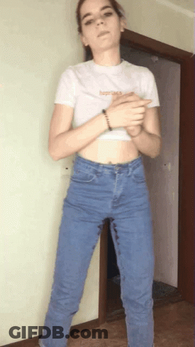 Woman In Crop Top Saying Happiness GIF