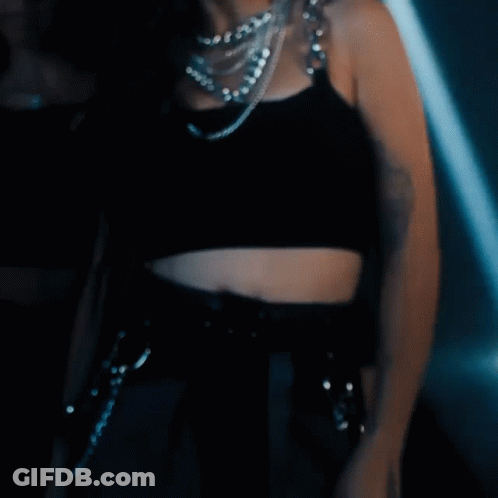 Woman In Crop Top Surrounded By Women GIF