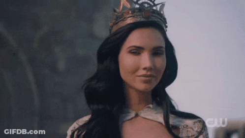 Woman In Crown And White Dress Smiling GIF