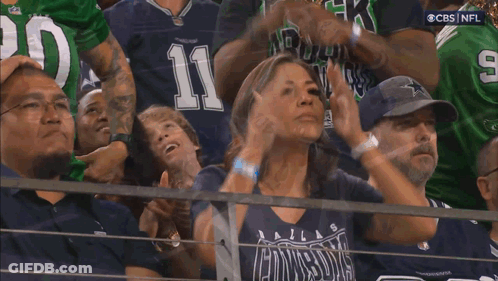 Woman In Dallas Cowboys Shirt Covering Face GIF