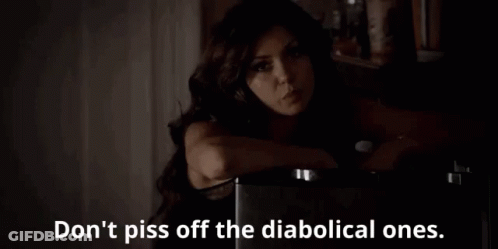 Woman In Dark Room Don't Piss Off The Diabolical Ones GIF
