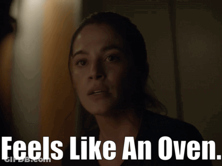 Woman In Dark Room Feels Like Oven GIF