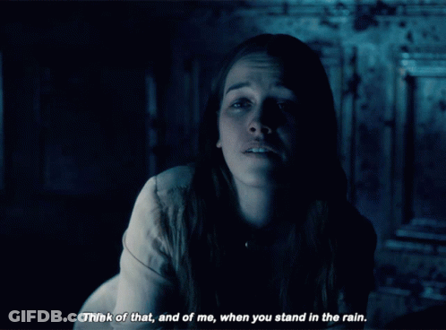 Woman In Dark Room Think Of That And Of Me When You Stand In The Rain GIF