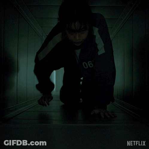Woman In Dark Room With Netflix GIF
