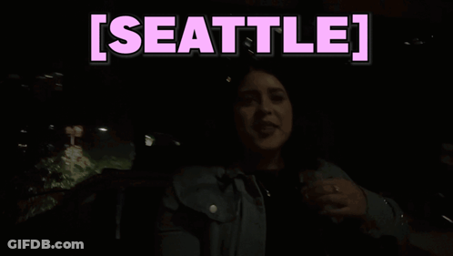 Woman In Dark Room With Pink Seattle GIF