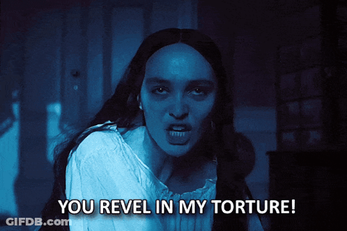 Woman In Dark Room You Revel In My Torture GIF