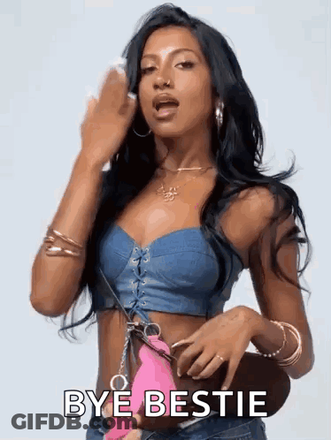Woman In Denim Crop Top Holding Pink Purse Says Bye Bestie GIF