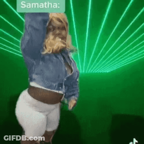 Woman In Denim Jacket Dancing Before Green Laser GIF