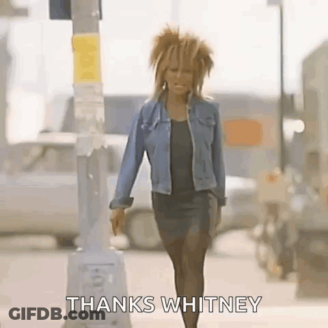 Woman In Denim Jacket Saying Thanks Whitney GIF