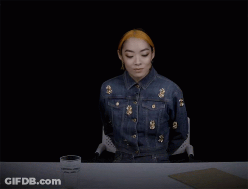 Woman In Denim Jacket Sitting GIF
