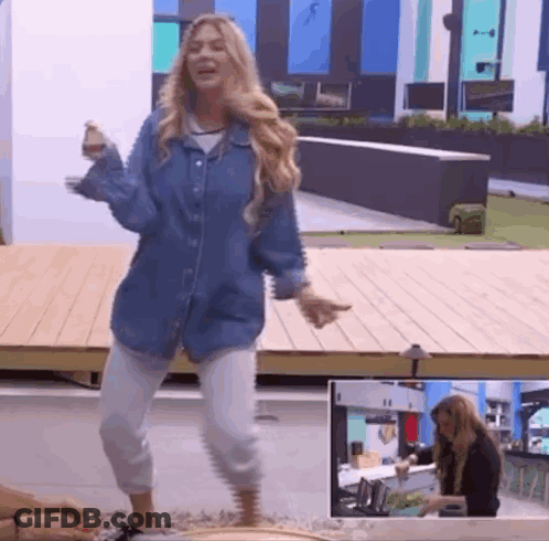 Woman In Denim Shirt And White Pants Dancing GIF
