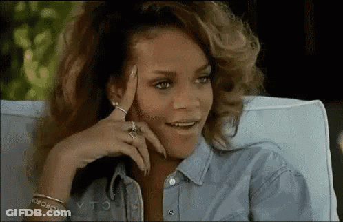 Woman In Denim Shirt Hand On Head GIF