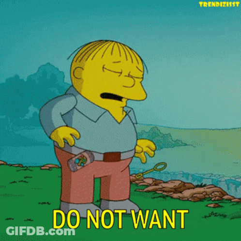 Woman In Denim Shirt Sitting Pink Chair At Wall Saying Ics GIF