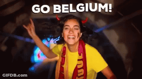 Woman In Devil Horns And Yellow Shirt Saying Go Belgium GIF