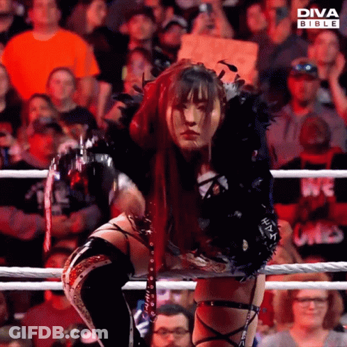 Woman In Diva Bible Costume In Ring GIF