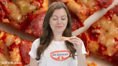 Woman In Dr. Oetker Shirt Eating Pizza GIF