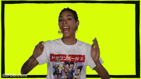 Woman In Dragon Ball Z T-Shirt On Yellow Background GIF