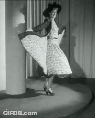Woman In Dress And Hat GIF