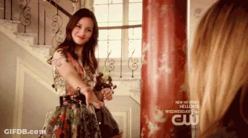Woman In Dress Curtain Saying Hello Cats GIF