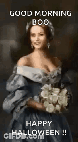 Woman In Dress Holding Flowers Says Good Morning Boo Happy Halloween GIF