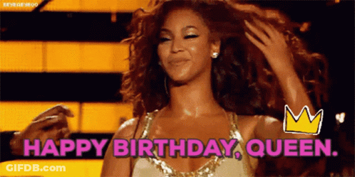 Woman In Dress Holding Hair Saying Happy Birthday Queen GIF