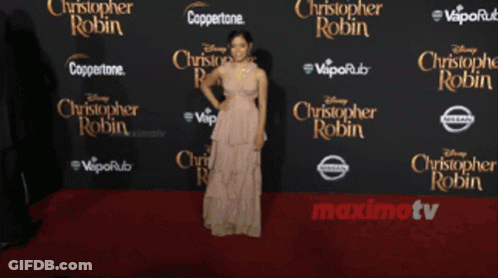 Woman In Dress On Disney Christopher Robin Red Carpet GIF
