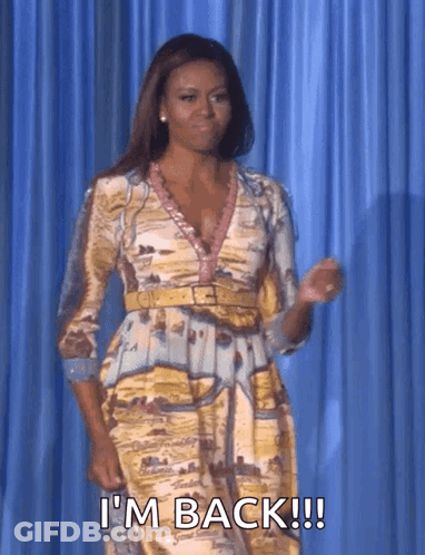 Woman In Dress Says I'm Back GIF